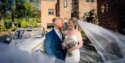 Bridal couple at Heather Glen Country House in Ainstable, Cumbria