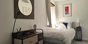 Twin bedroom at The Coach House at Brackenthwaite Farm near Arnside