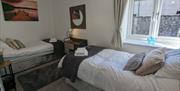 Twin bedroom at The Coach House at Brackenthwaite Farm near Arnside