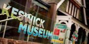 Signage outside Keswick Museum in Keswick, Lake District