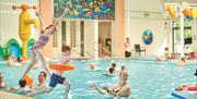 Families at the pool at Lakeland Leisure Park in Flookburgh, Cumbria