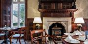 Lounge and dining at Ambleside Manor Vegetarian Guest House in Ambleside, Lake District