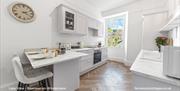 Kitchen and dining space in a cottage available from Fernwood Cottages in the Lake District & Cumbria