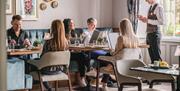 Guests eating at the restaurant at The Borrowdale Hotel in Borrowdale, Lake District