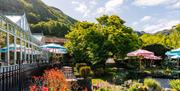 Garden and conservatory views at The Borrowdale Hotel in Borrowdale, Lake District