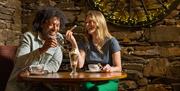 Enjoying drinks at Limefitt Holiday Park in Troutbeck, Lake District
