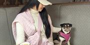 Visitor with a dog at The Dunes Hotel in Barrow-in-Furness, Cumbria