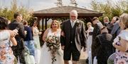 Bridal couple getting married at The Dunes Hotel in Barrow-in-Furness, Cumbria © Becky Goligy: Photographer