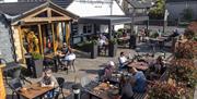 Outdoor seating at The Galloping Horse in High Harrington, Cumbria
