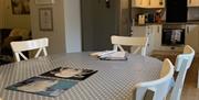 Dining table in Glenside Cottage at Sawrey Cottages in Far Sawrey, Lake District