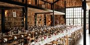 Wedding breakfast seating at Hidden River Barn near Longtown, Cumbria