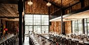 Wedding breakfast seating at Hidden River Barn near Longtown, Cumbria