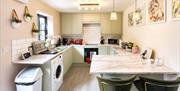 Kitchen and breakfast bar in La Petite Mews from Muddy Boots Escapes in Kirkby Stephen, Cumbria