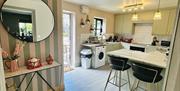 Kitchen with breakfast bar in La Petite Mews from Muddy Boots Escapes in Kirkby Stephen, Cumbria