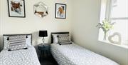 Twin bedroom in Scarpa from Muddy Boots Escapes in Kirkby Stephen, Cumbria