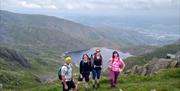 Visitors on a guided walk with South Lakes Adventures in the Lake District, Cumbria