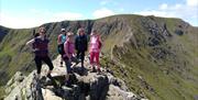 Visitors on a guided walk with South Lakes Adventures in the Lake District, Cumbria
