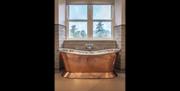 Freestanding bathtub at Lake View at The Lingholm Estate in Portinscale, Lake District
