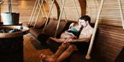 Couple in a Sauna at The Spa at Low Wood Bay Resort in Windermere, Lake District