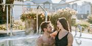 Couple in a Hot Tub at The Spa at Low Wood Bay Resort in Windermere, Lake District
