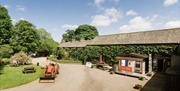 Farm shop and tractor at Sizergh Caravan and Camping
