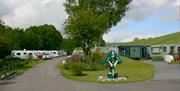 Caravans at Waters Edge Caravan Park in Crooklands, Cumbria