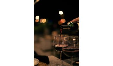 Wine being poured at The Five O'Clock Club at Bartons Yard at The Halston in Carlisle, Cumbria
