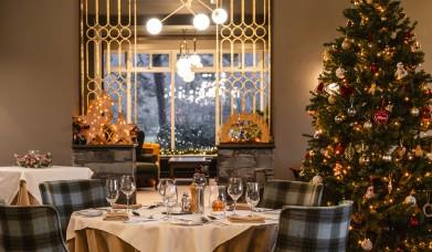 Christmas decorations and dining tables at Borrowdale Gates Hotel in the Lake District, Cumbria
