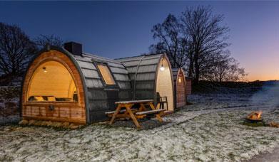 Cabin at Parkgate Farm Holidays at dusk in the wintertime