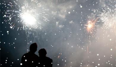 Silhouette of a Couple watching Fireworks