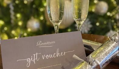 Gift voucher for Roundthorn Country House with prosecco and a Christmas cracker