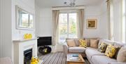 Lounge and fireplace at Bramblewood Cottage Guest House in Keswick, Lake District