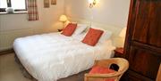 Master bedroom in Saddleback Barn at Near Howe Cottages in Mungrisdale, Lake District