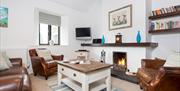 Lounge and Fireplace at Helm Farm Self Catering Cottages in Windermere, Lake District