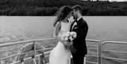 Bridal Couple on a Windermere Lake Cruises Vessel with a Scenic Backdrop in the Lake District, Cumbria