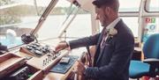 Groom on a Windermere Lake Cruises Vessel in the Lake District, Cumbria
