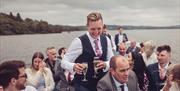 Wedding Guests on a Windermere Lake Cruises Vessel in the Lake District, Cumbria