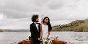 Bridal Couple on a Windermere Lake Cruises Vessel with a Scenic Backdrop in the Lake District, Cumbria