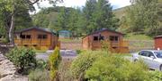 Our lodges: Sycamore View (left) and Hazel Cottage (right)	