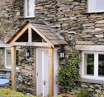Exterior and entrance to Kestrel Cottage at Wall Nook Cottages near Cartmel, Cumbria
