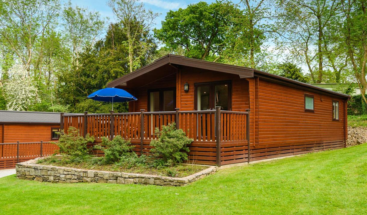 Exterior and Balcony at Woodlands Pine Lodges in Meathop, Lake District