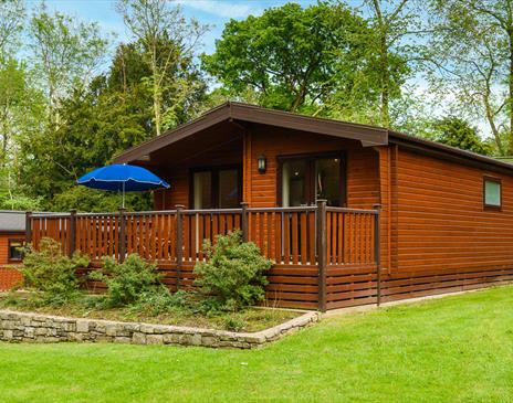 Exterior and Balcony at Woodlands Pine Lodges in Meathop, Lake District
