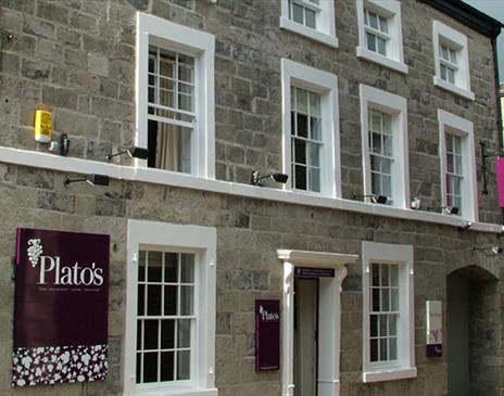 Exterior and signage at Plato's in Kirkby Lonsdale, Cumbria