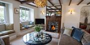 Lounge Area and Fireplace at Stone Cottage in Patterdale, Lake District