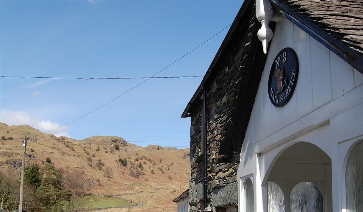 Exterior of No. 3 Main Street and View of Loughrigg Fell in Elterwater, Lake District