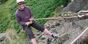 Abseiling with More Than Mountains near Coniston, Lake District