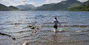 Paddling in Ullswater near Aira Force Waterfall in Matterdale, Lake District © National Trust Images, Paul Harris
