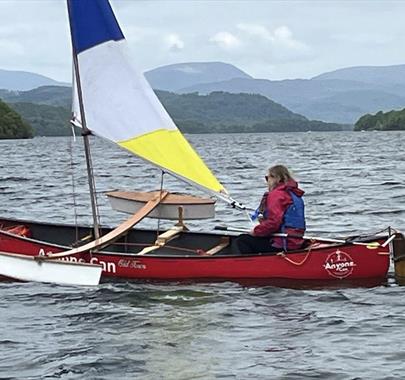 Visitor Sailing on an Accessible Canoe with Anyone Can in the Lake District, Cumbria