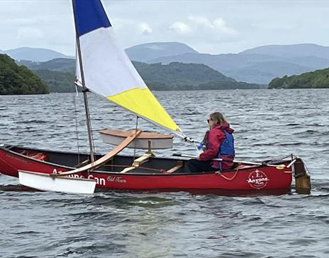 Visitor Sailing on an Accessible Canoe with Anyone Can in the Lake District, Cumbria