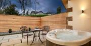 Hot Tub and Outdoor Seating in the Harrop Suite at Applegarth Villa Hotel & Restaurant in Windermere, Lake District